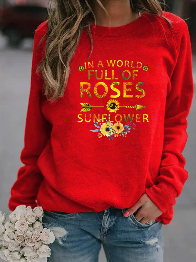 Dame sweatshirt med inspirerende design og blomsterdekoration Stilla