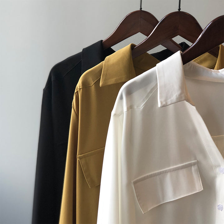 Dame elegant bluse med struktureret snit og praktiske brystlommer Stilla