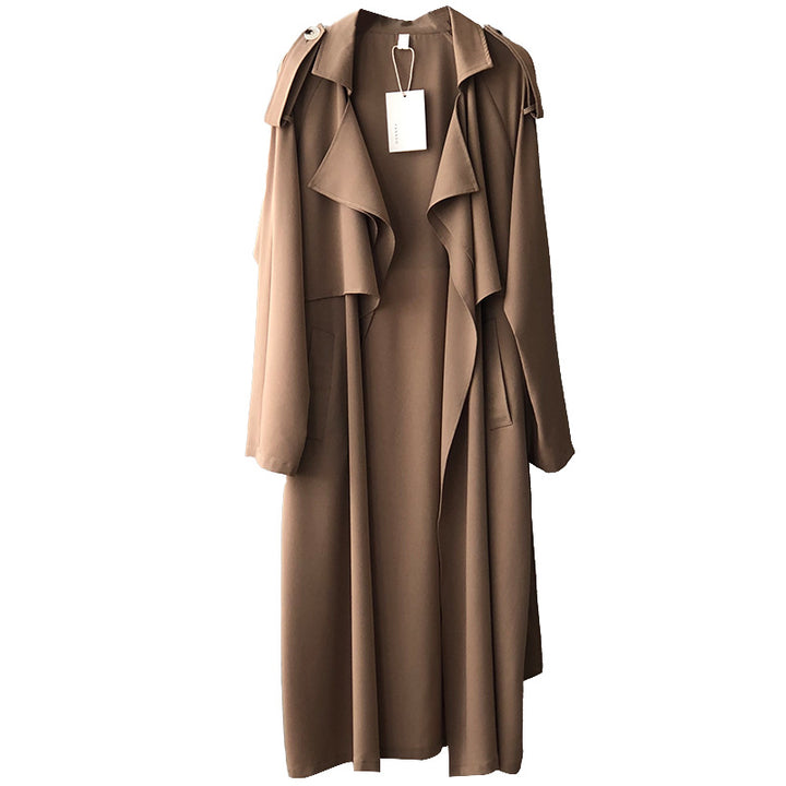 Dame mode trenchcoat med asymmetrisk snit og praktiske lommer Stilla
