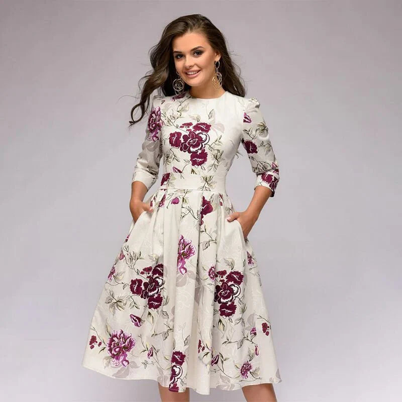 Stilla | Elegant Midikjole Med Vidde Skørt Og Blomsterprint Til Særlige Anledninger