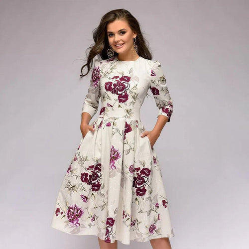 Stilla | Elegant Midikjole Med Vidde Skørt Og Blomsterprint Til Særlige Anledninger