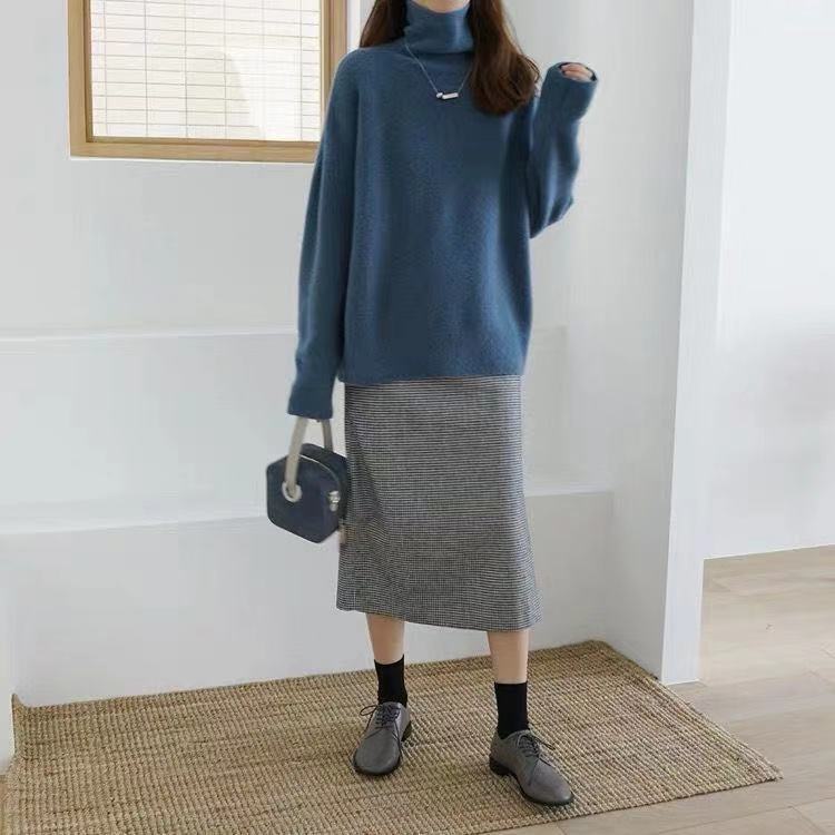 Kvinders hyggelige turtleneck sweater lavet af blødt materiale med oversized pasform Stilla