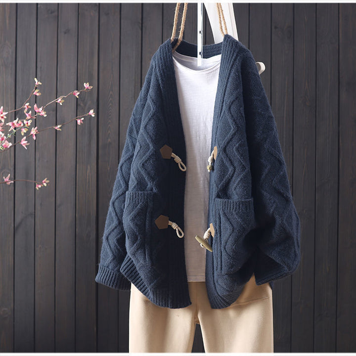 Kvinders chunky strikket cardigan med unik kabelstrikstruktur og fashionable knapdetaljer Stilla