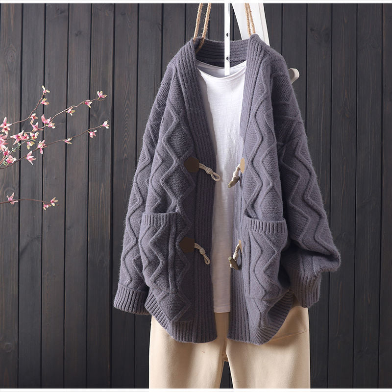 Kvinders chunky strikket cardigan med unik kabelstrikstruktur og fashionable knapdetaljer Stilla