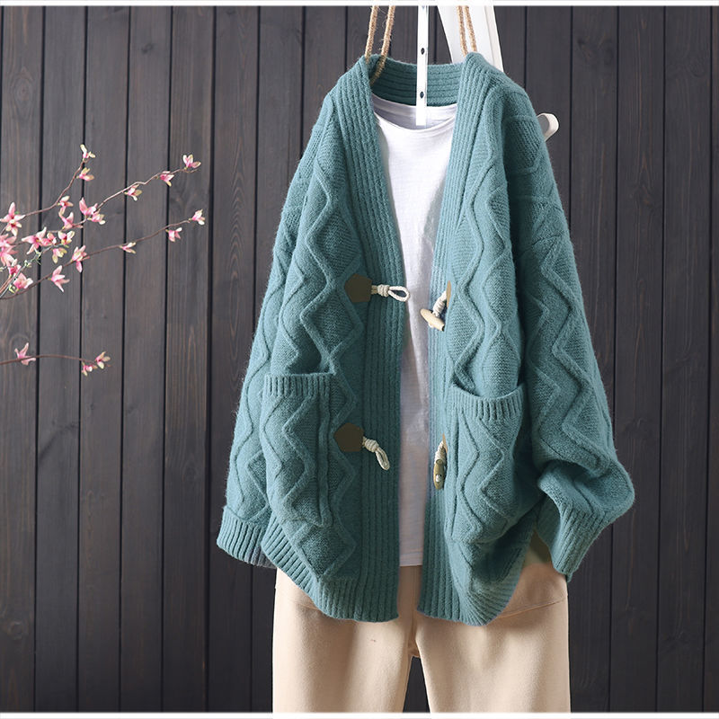 Kvinders chunky strikket cardigan med unik kabelstrikstruktur og fashionable knapdetaljer Stilla