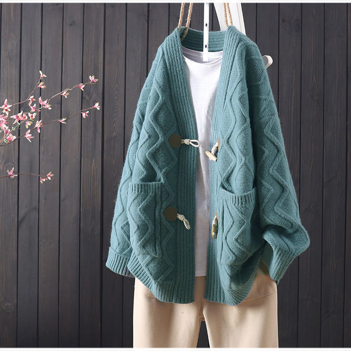 Kvinders chunky strikket cardigan med unik kabelstrikstruktur og fashionable knapdetaljer Stilla