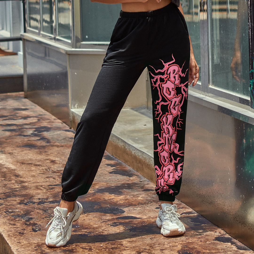 Kvinders afslappede sweatpants med kontrast grafisk print på siden Stilla