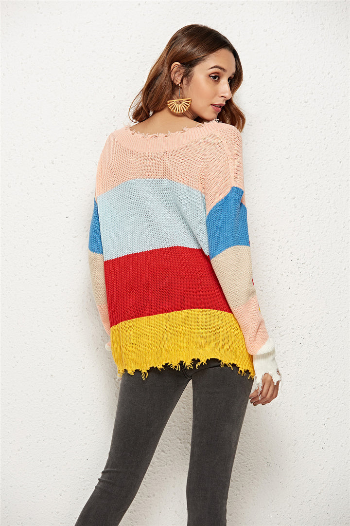 Dame afslappet strikket pullover med dyb V-hals og moderne stribet mønster Stilla