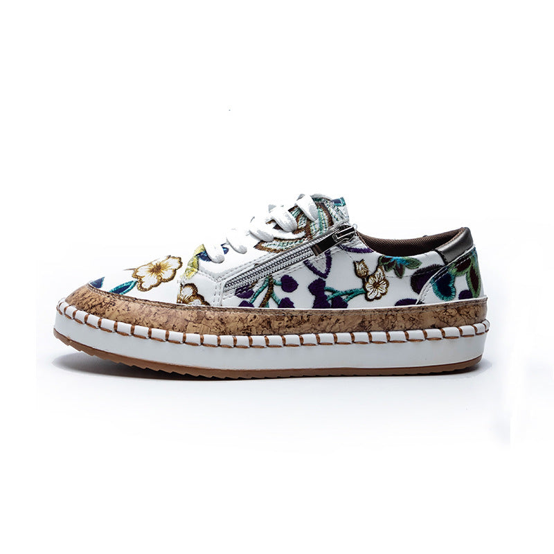 Dame sneakers med moderne blomsterbroderi og komfortabel lynlås Stilla