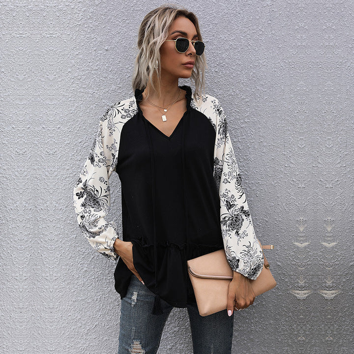 Dame hoodie med blomsterdesign og peplum snit Skovae