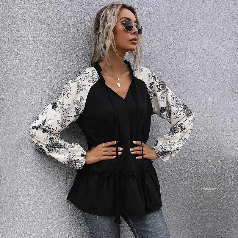 Dame hoodie med blomsterdesign og peplum snit Skovae