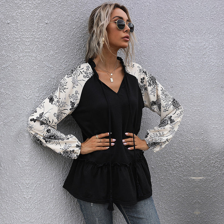 Dame hoodie med blomsterdesign og peplum snit Skovae