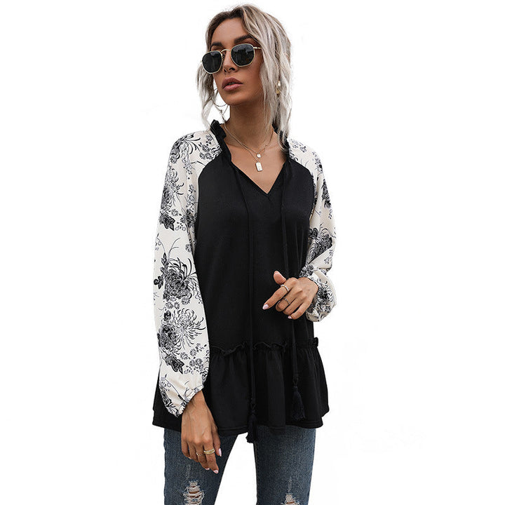 Dame hoodie med blomsterdesign og peplum snit Skovae