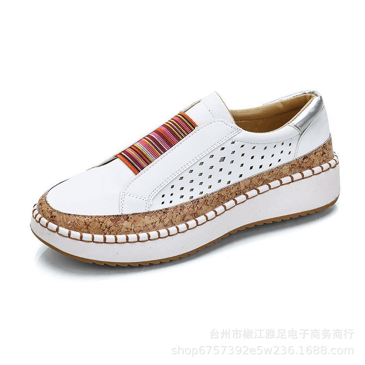 Dame sneakers med perforeret design og mode bast-detalje Stilla
