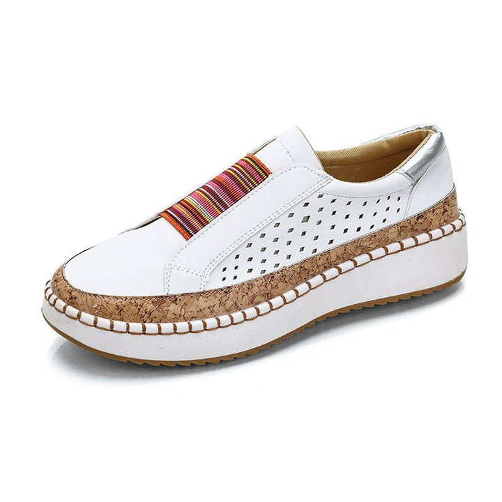 Dame sneakers med perforeret design og mode bast-detalje Stilla