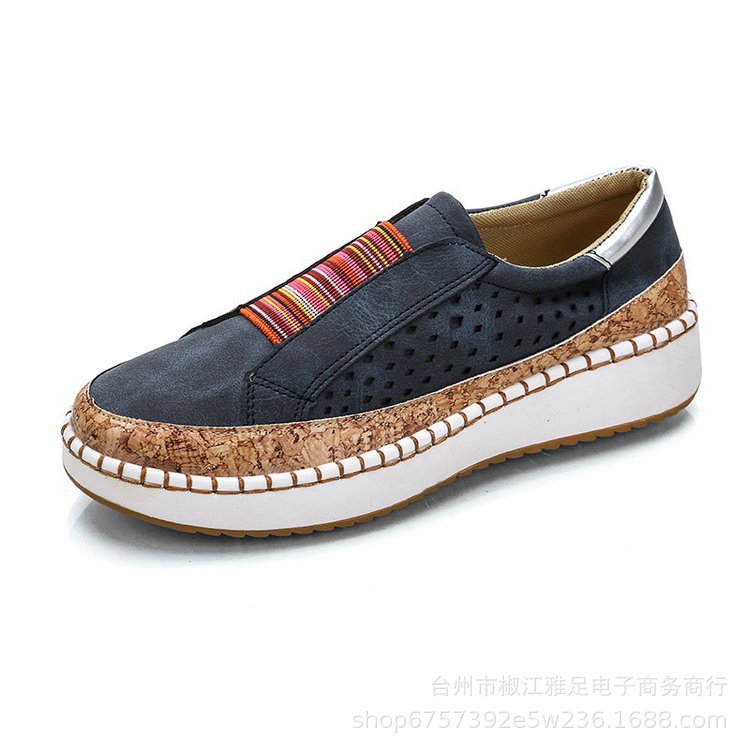 Dame sneakers med perforeret design og mode bast-detalje Stilla