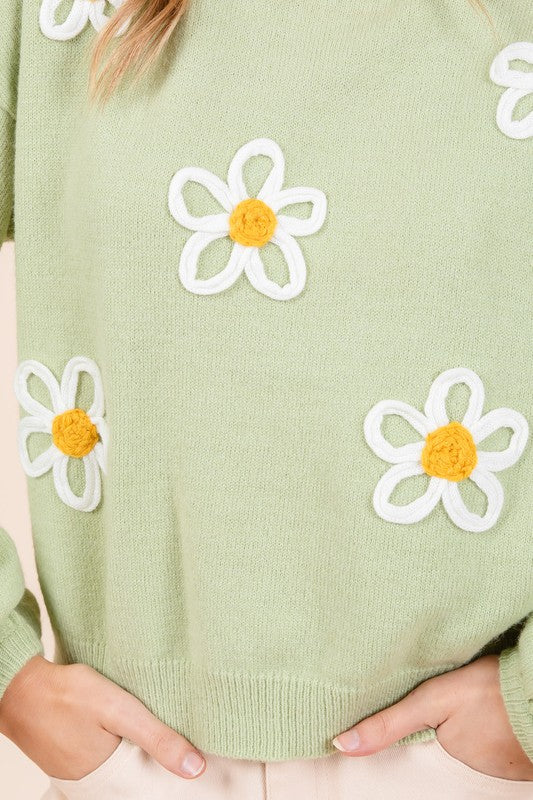 Stilla | Striktrøje med blomsterbroderi på forsiden