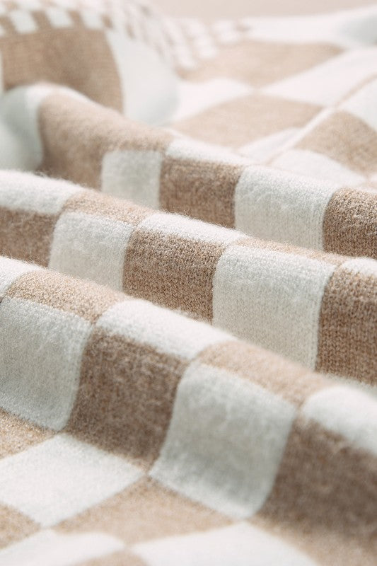 Stilla | Rund hals pullover med ternet mønster og faldende skuldre