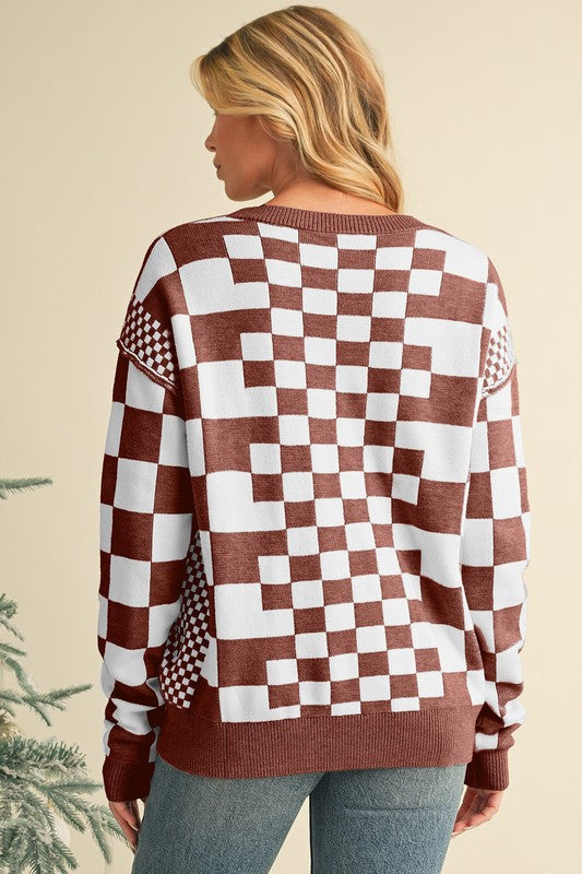 Stilla | Rund hals pullover med ternet mønster og faldende skuldre