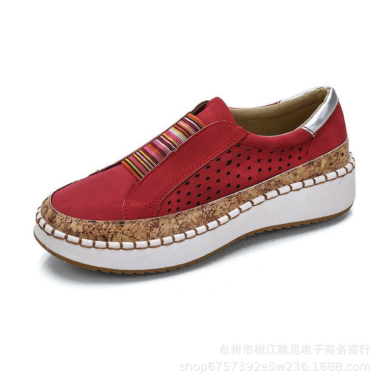 Dame sneakers med perforeret design og mode bast-detalje Stilla