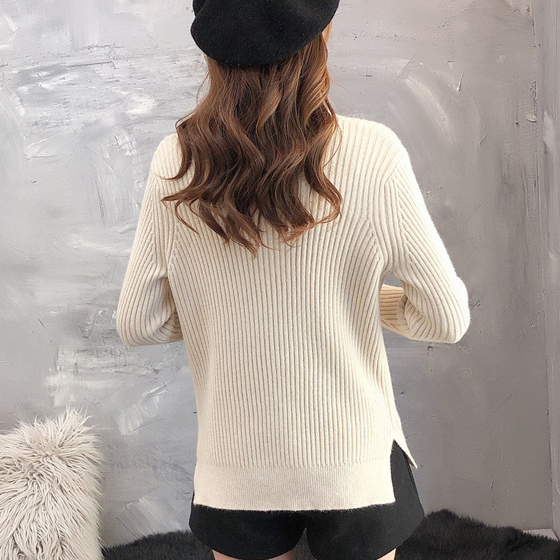 Kvindernes strikket sweater med opretstående krave og tekstureret design Stilla