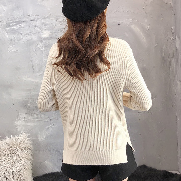 Kvindernes strikket sweater med opretstående krave og tekstureret design Stilla