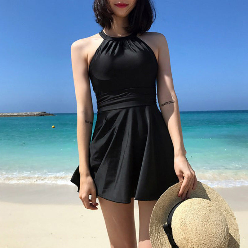 Dame swimsuit med moderne rygskæring og legende skirt Skovae