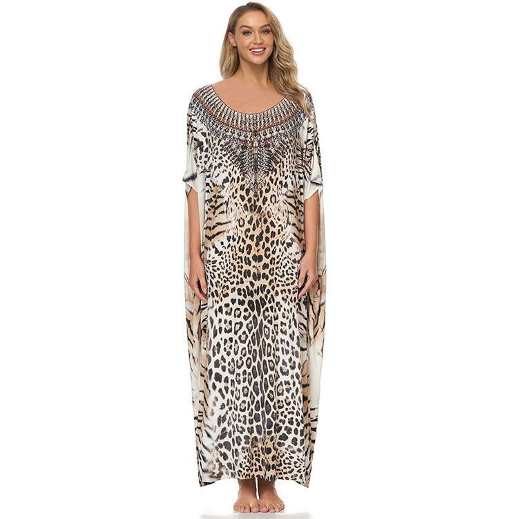 Dame strandkaftan med kunstnerisk dyreprint og elegante accenter Stilla