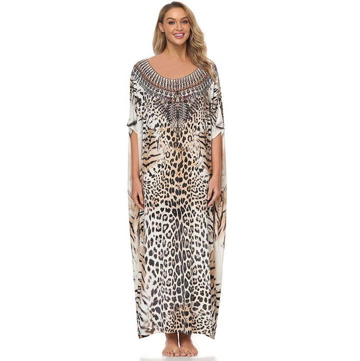 Dame strandkaftan med kunstnerisk dyreprint og elegante accenter Stilla