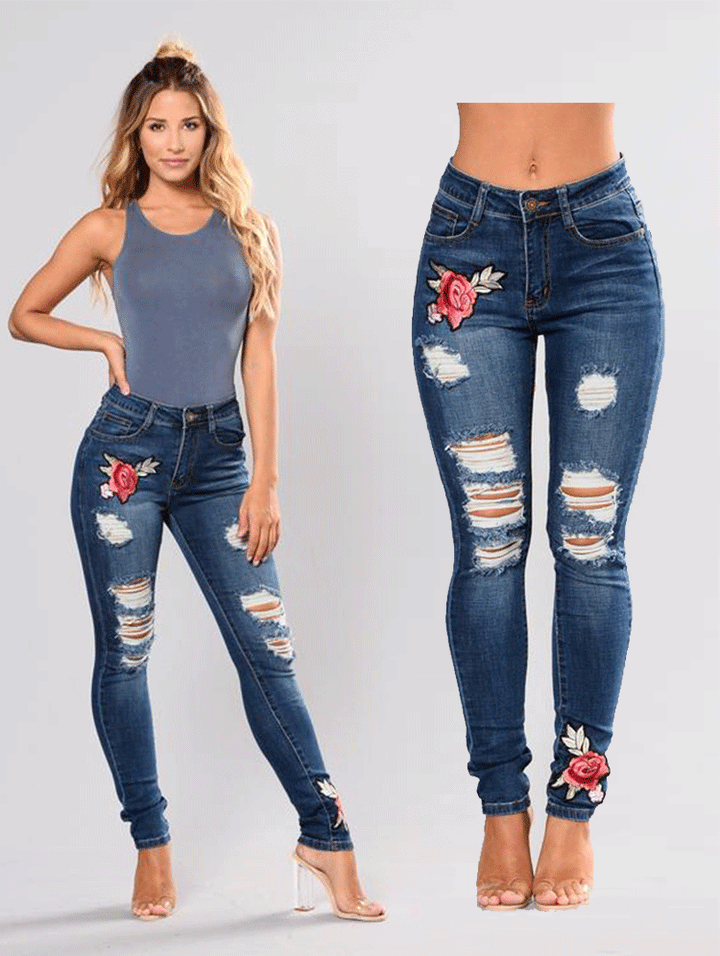 Dame skinny jeans med florale applikationer og moderigtigt used-look Stilla