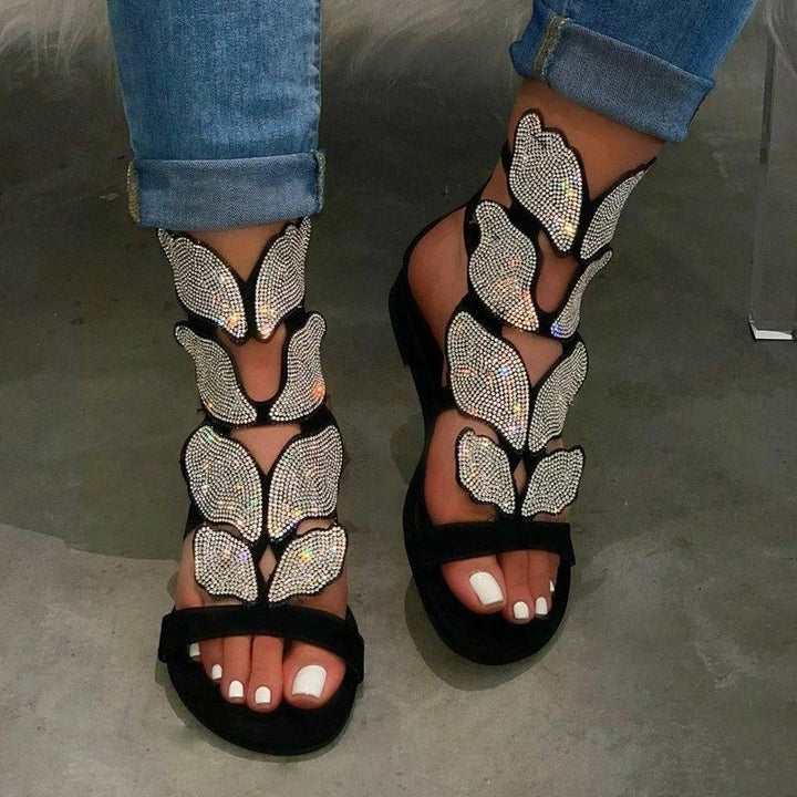 Dame sandaler med funkende sommerfugledesign og komfortabelt fodseng Stilla