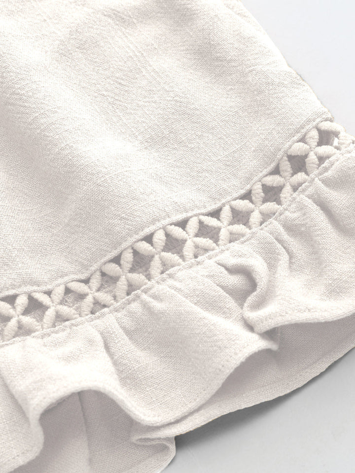 Stilla | Elegant hvid afslappet kjole med struktur.