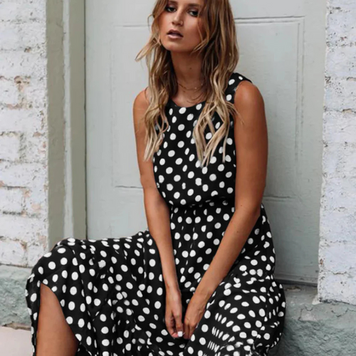Skovae | Sorte polka dot midikjole til et retro chic look