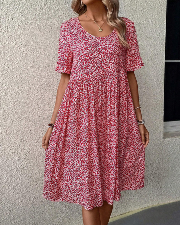 Stilla | Elegant Midi-Kjole med Blomster
