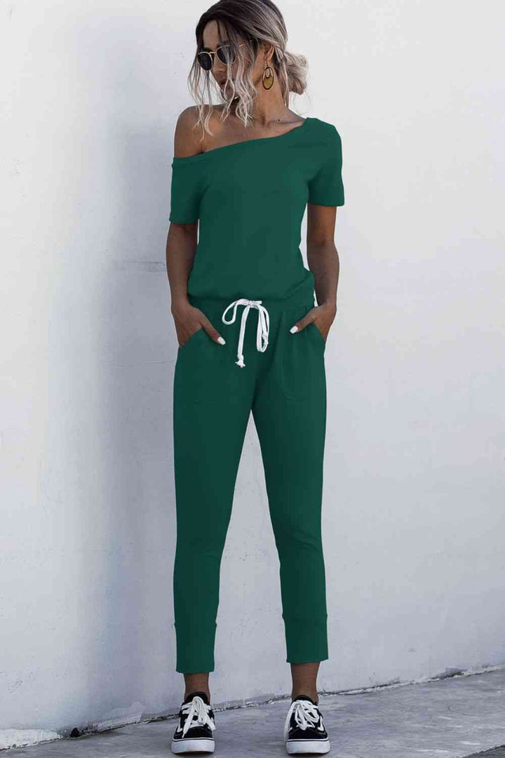 Stilla | Halsbundet Jumpsuit Med Lommer