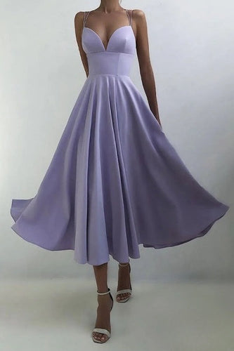 Skovae | Elegant midi-kjole med spaghetti-stropper til særlige anledninger