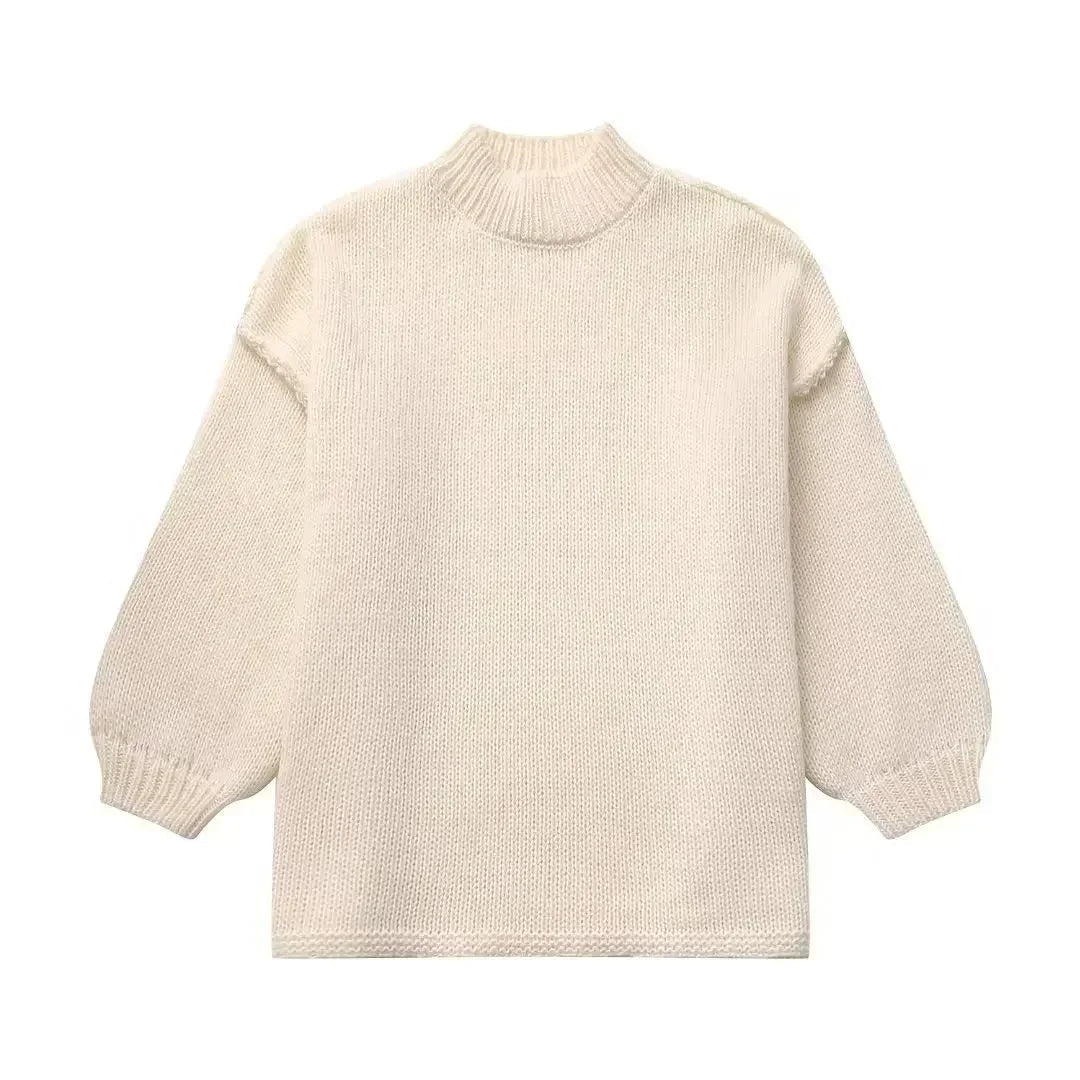 Stilla | Strikket rullekravepullover med voluminøse statement-ærmer