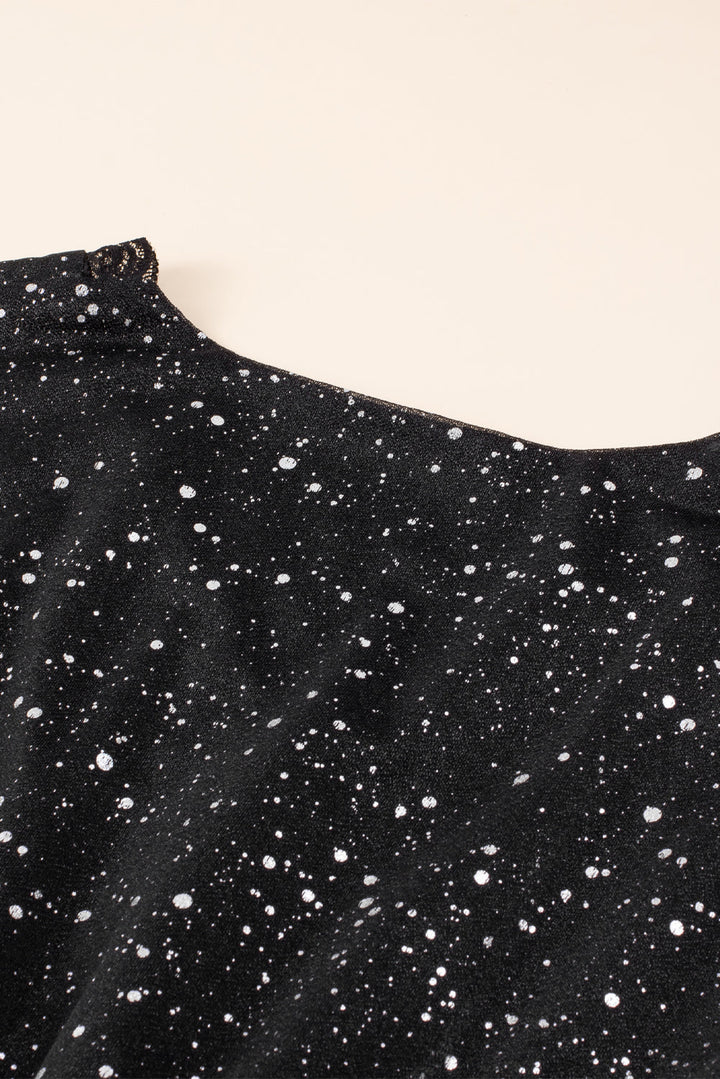 Stilla | Elegant sort glitrende kjole med mesh sene