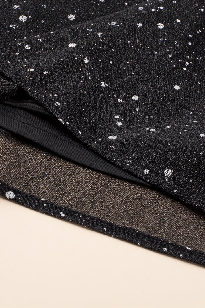 Stilla | Elegant sort glitrende kjole med mesh sene