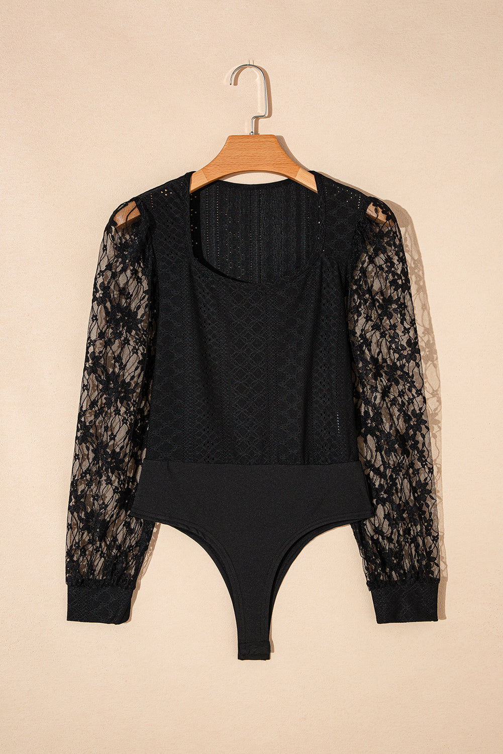 Stilla | Spids-langærmet-bodysuit