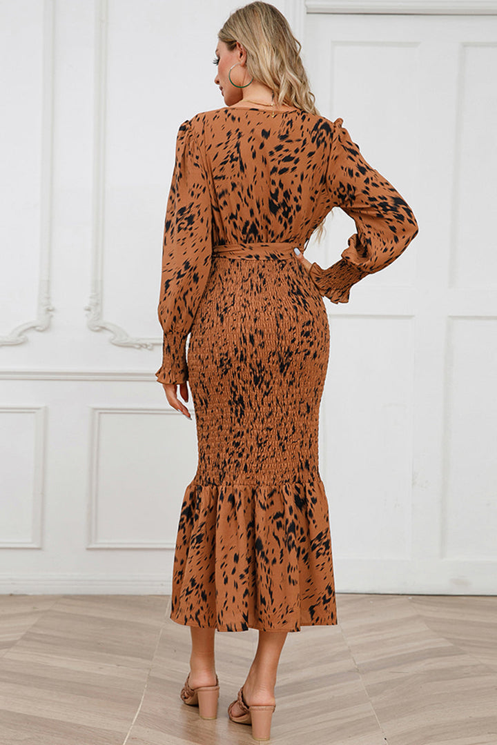 Stilla | V-Hals Smocked Midi Kjole