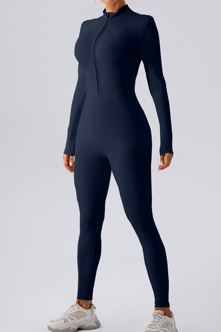 Stilla | Zip Mock Hals Aktiv Jumpsuit