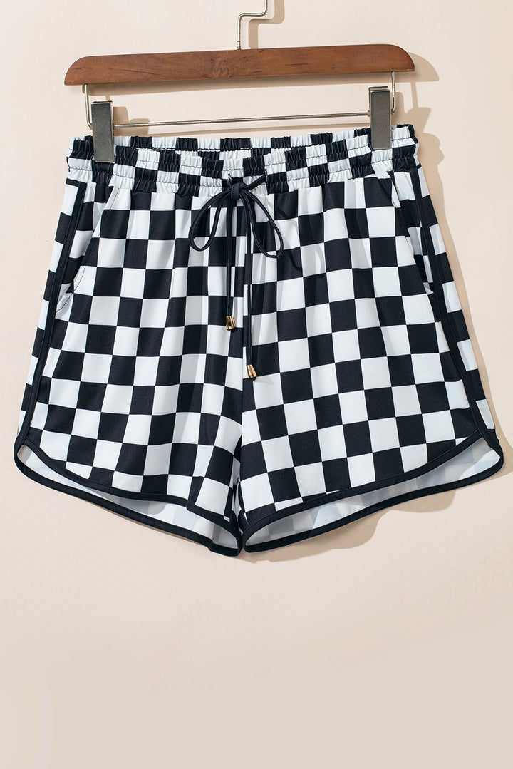 Stilla | Rutede shorts med lommer