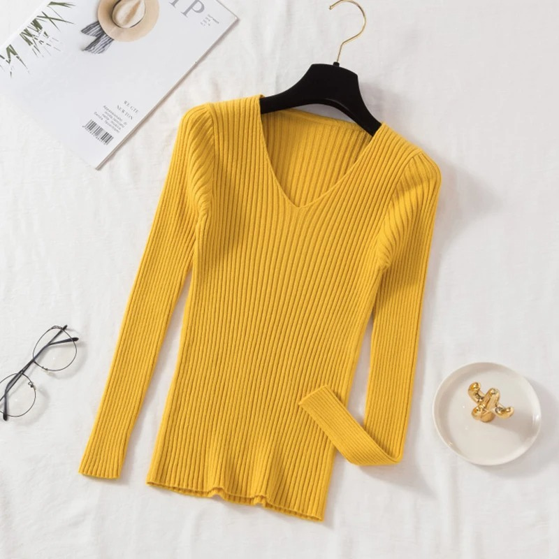 Stilla | Slim-fit-uppe med rib-v-udskæring til et smart look