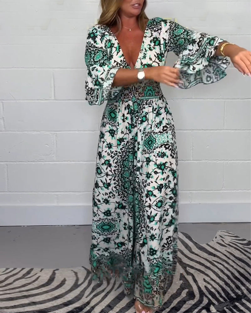 Stilla | Jumpsuit med Print og Dyb V-Udskæring