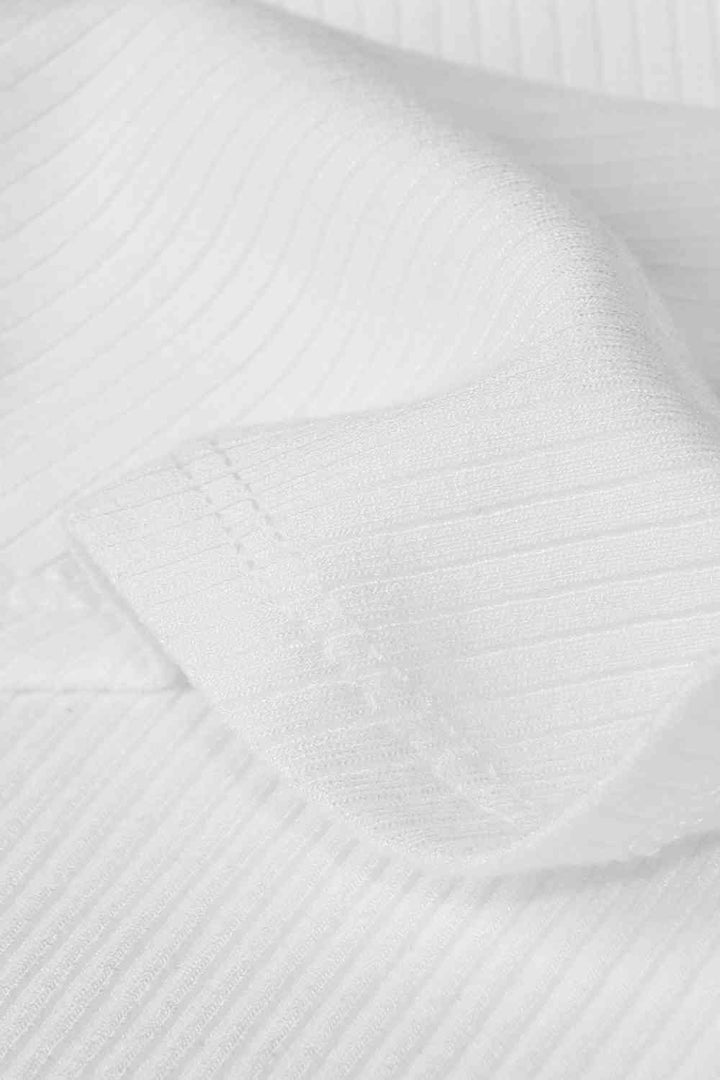 Stilla | Ruffle Trim Ærmeløs Bodysuit