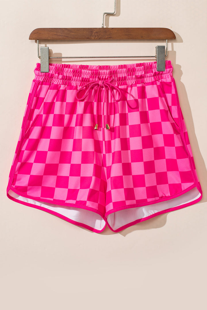 Stilla | Rutede shorts med lommer