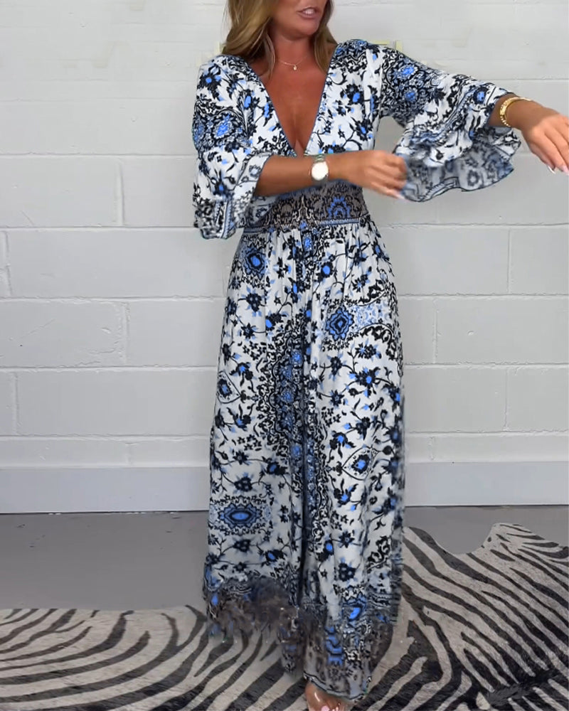 Stilla | Jumpsuit med Print og Dyb V-Udskæring