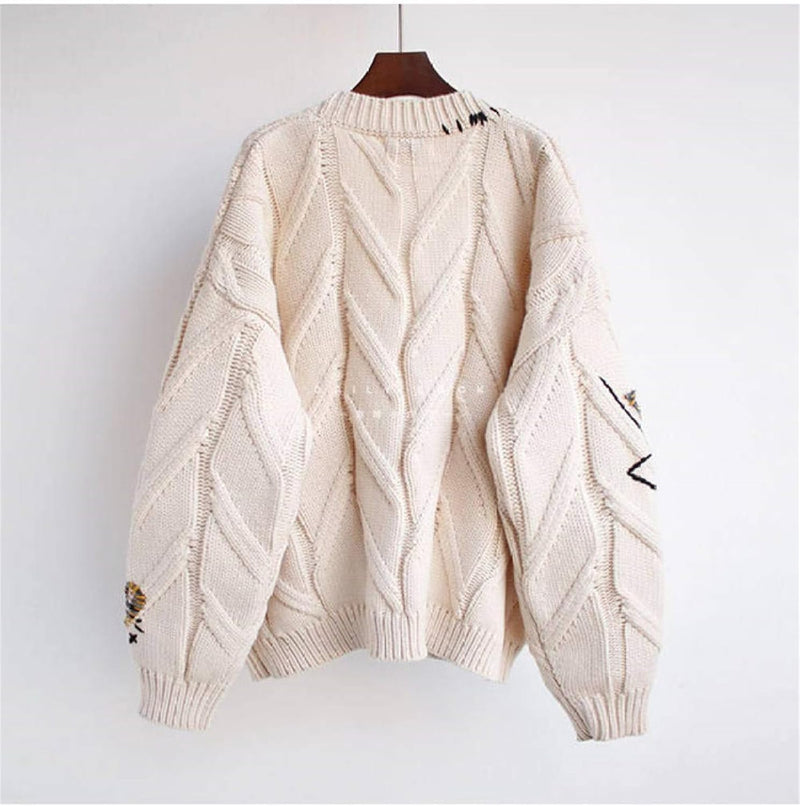 Stilla | Strikjakke med patchwork-accenter
