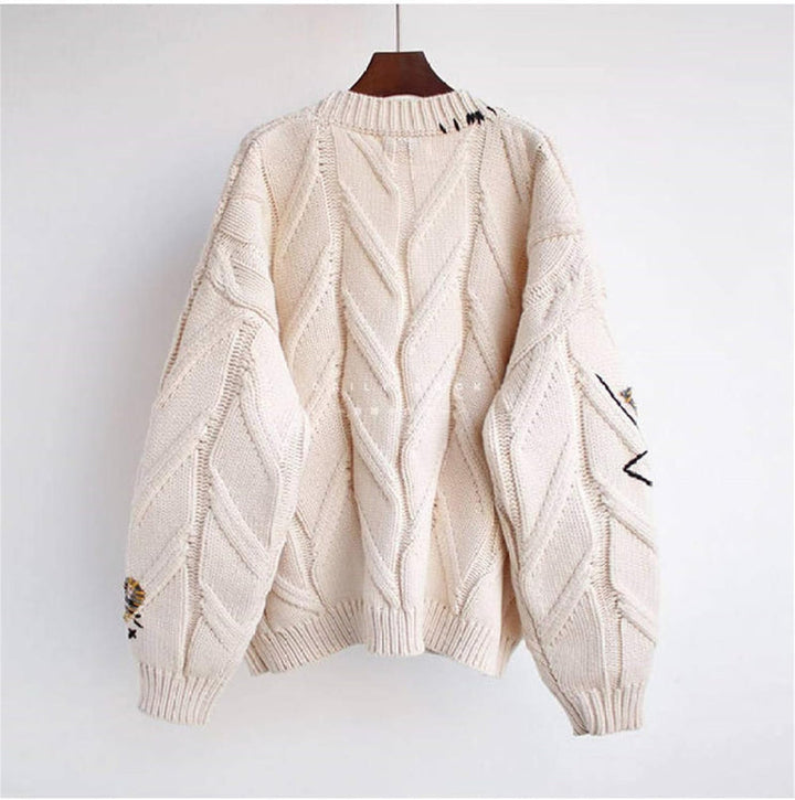 Stilla | Strikjakke med patchwork-accenter